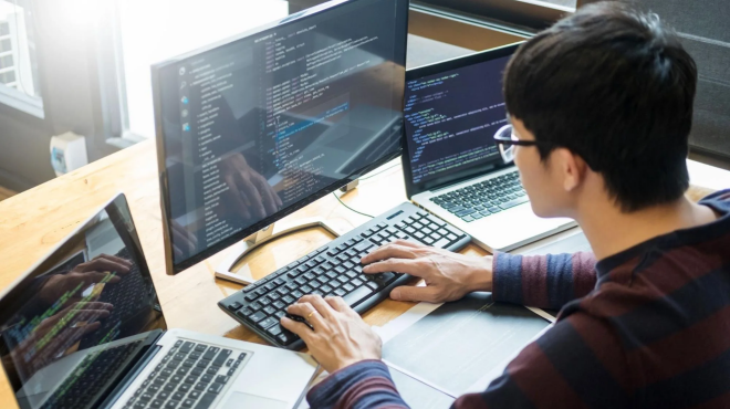 A person working on code on their computer.