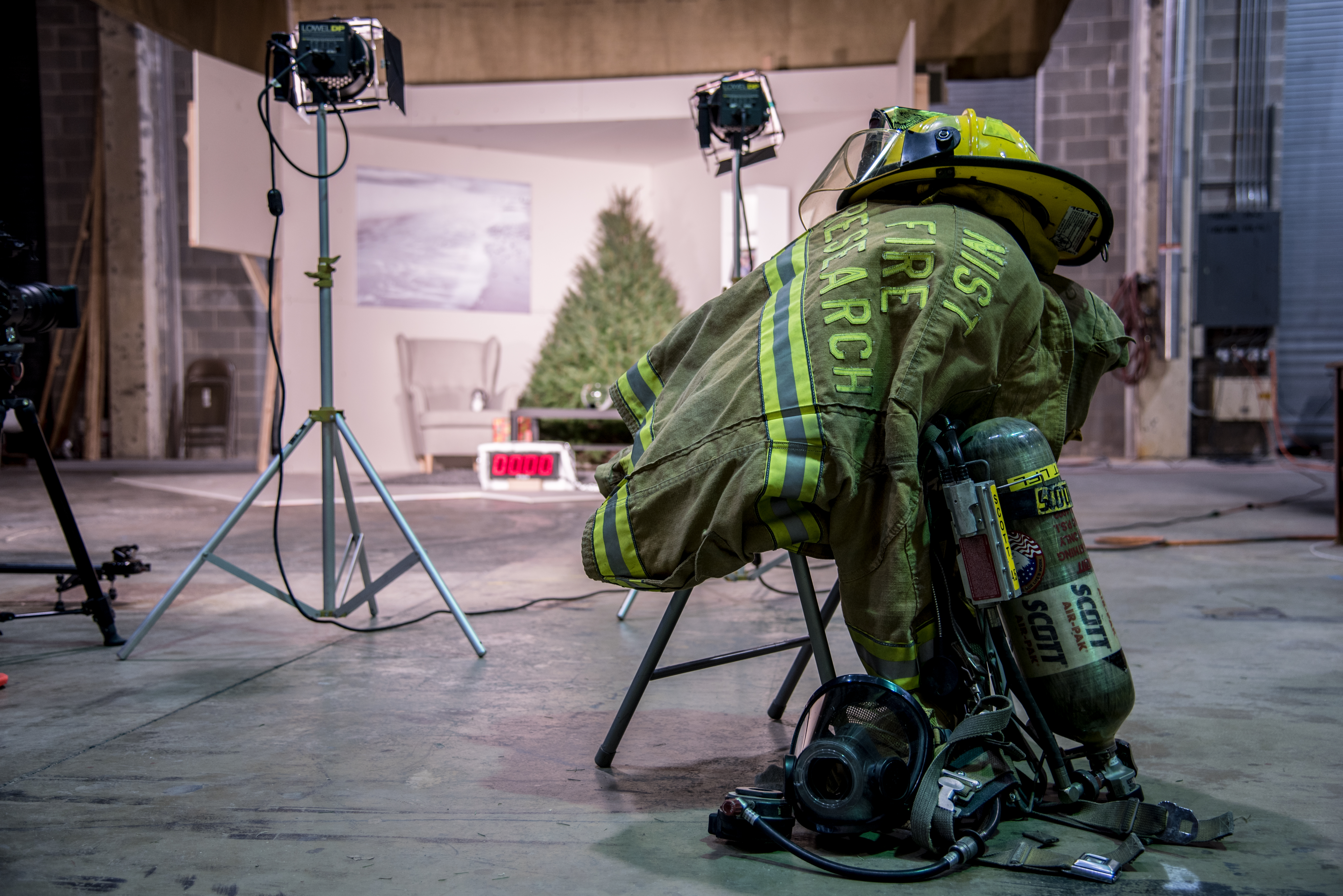 Fire hat, tank and mask and jacket sit ready for use.